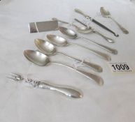 A mixed lot of silver spoons, button hook, plaque etc.