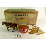 A Britain's home farm tumbrel horse and cart,
