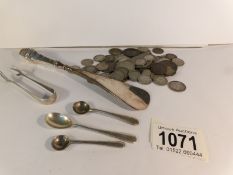 A silver handled shoe horn, 3 silver salt/mustard spoons,