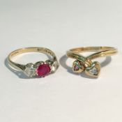 2 9ct gold rings set with precious stones,