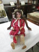 A Victorian porcelain headed Armand Marseille doll