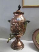 An embossed copper 19th century tea urn