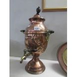 An embossed copper 19th century tea urn