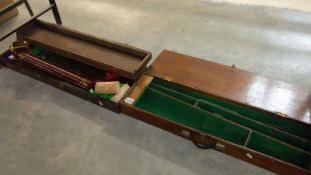 2 gun cases including cleaning rods and equipment