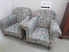 A pair of old arm chairs