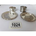 2 silver pin trays, hall marked Birmingham 1918 and 2 silver napkin rings, 83.