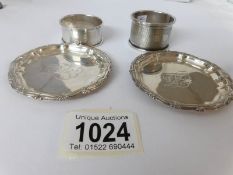 2 silver pin trays, hall marked Birmingham 1918 and 2 silver napkin rings, 83.