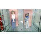 2 boxed NAO figurines