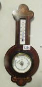 An oak cased barometer with marquetry inlay