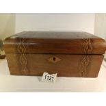 A mahogany inlaid sewing box