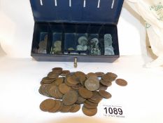 A quantity of British and Canadian coins including silver and a set of Rosary beads