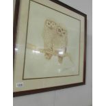 A framed and glazed print of 2 owls