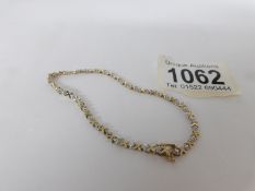 A 9ct gold and diamond bracelet