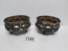 A pair of Indian silver pots