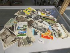 In excess of 320 postcards, topographical, humorous,
