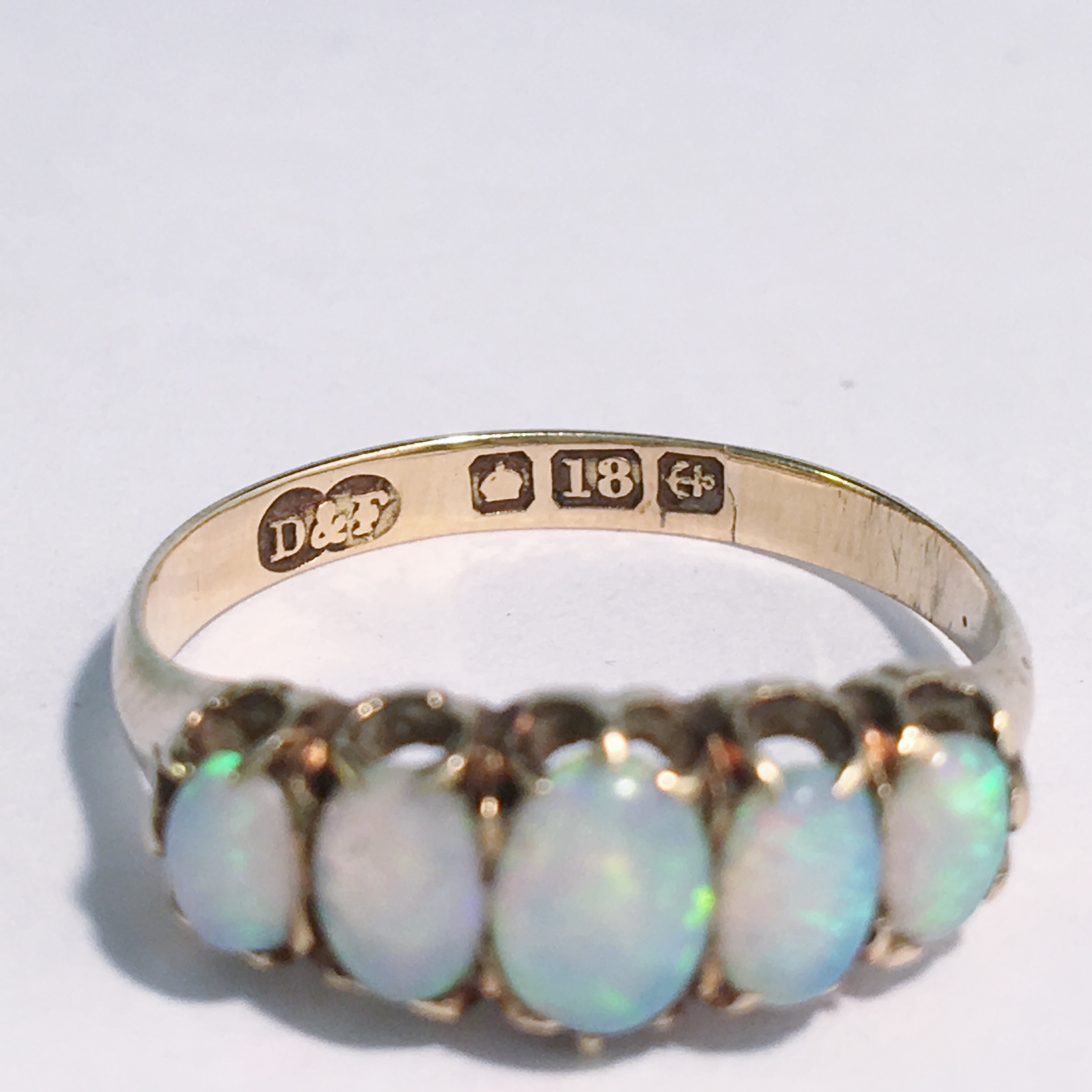 An 18ct gold ring set 5 opals, - Image 2 of 3