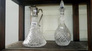 A cut glass decanter and claret jug