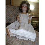 A Victorian porcelain headed Armand Marseille doll