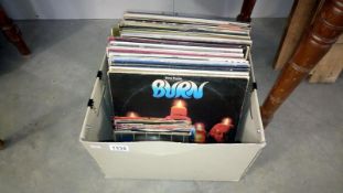 A collection of LP records and singles including Deep Purple, ACDC, Genesis,