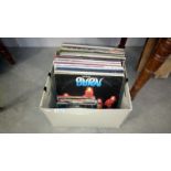 A collection of LP records and singles including Deep Purple, ACDC, Genesis,