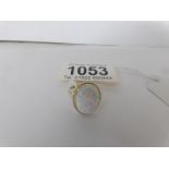 A 9ct gold ring set large oval opal,