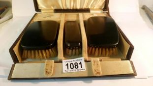 An early 20th century gentleman's grooming set in travel case