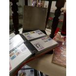 A collection of Jersey and Guernsey mint stamps and first day covers