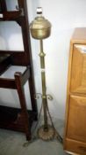 A Victorian brass standard lamp