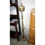 A Victorian brass standard lamp