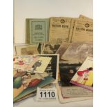 A mixed lot of ration books, photographs,