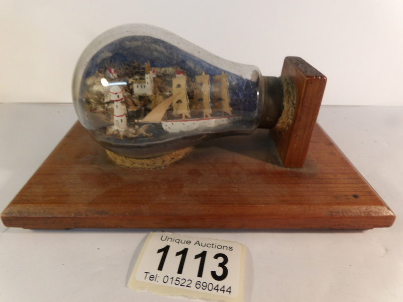 A miniature coastal scene in a light bulb made by a German prisoner of war at POW camp Stratford - Image 5 of 6