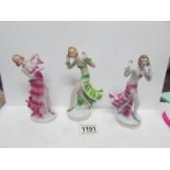 3 figures of dancing ladies