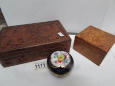 2 trinket boxes both with a collection of hair grips including tortoise shell.