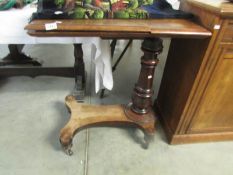 A mahogany invalid table