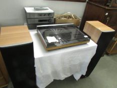 A Bang and Olufsen Beogram 6000 record player with speakers - Quad 306 power amp.