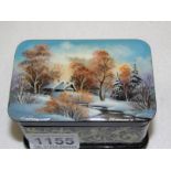 A hand painted and signed Russian lacquered box with winter scene