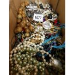 A mixed lot of costume jewellery, necklaces,