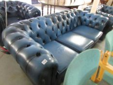 A blue leather 3 seater Chesterfield sofa