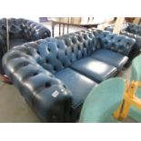 A blue leather 3 seater Chesterfield sofa