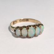 An 18ct gold ring set 5 opals,