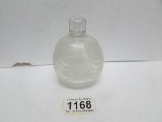 An art glass globular bottle