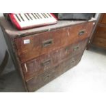 A 3 drawer chest with brass handles