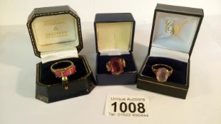 2 9ct gold rings and a silver ring set with various precious stones