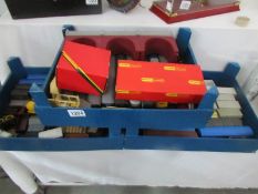 A large quantity of unboxed Triang Hornby 00/H0 rolling stock, goods wagons and carriages,