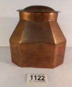 An arts and crafts copper tea caddy with tin lining