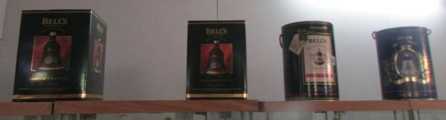 3 Bells Christmas whisky decanters, 1990-1992 and a Bells Eugenie decanter,