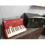 A Pietro piano accordion with case