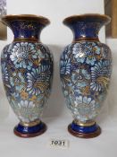 A pair of Royal Doulton salt glaze vases