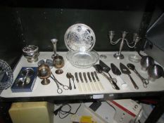 A mixed lot of silver plate including tray, candelabra,