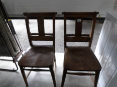 A pair of chapel chairs